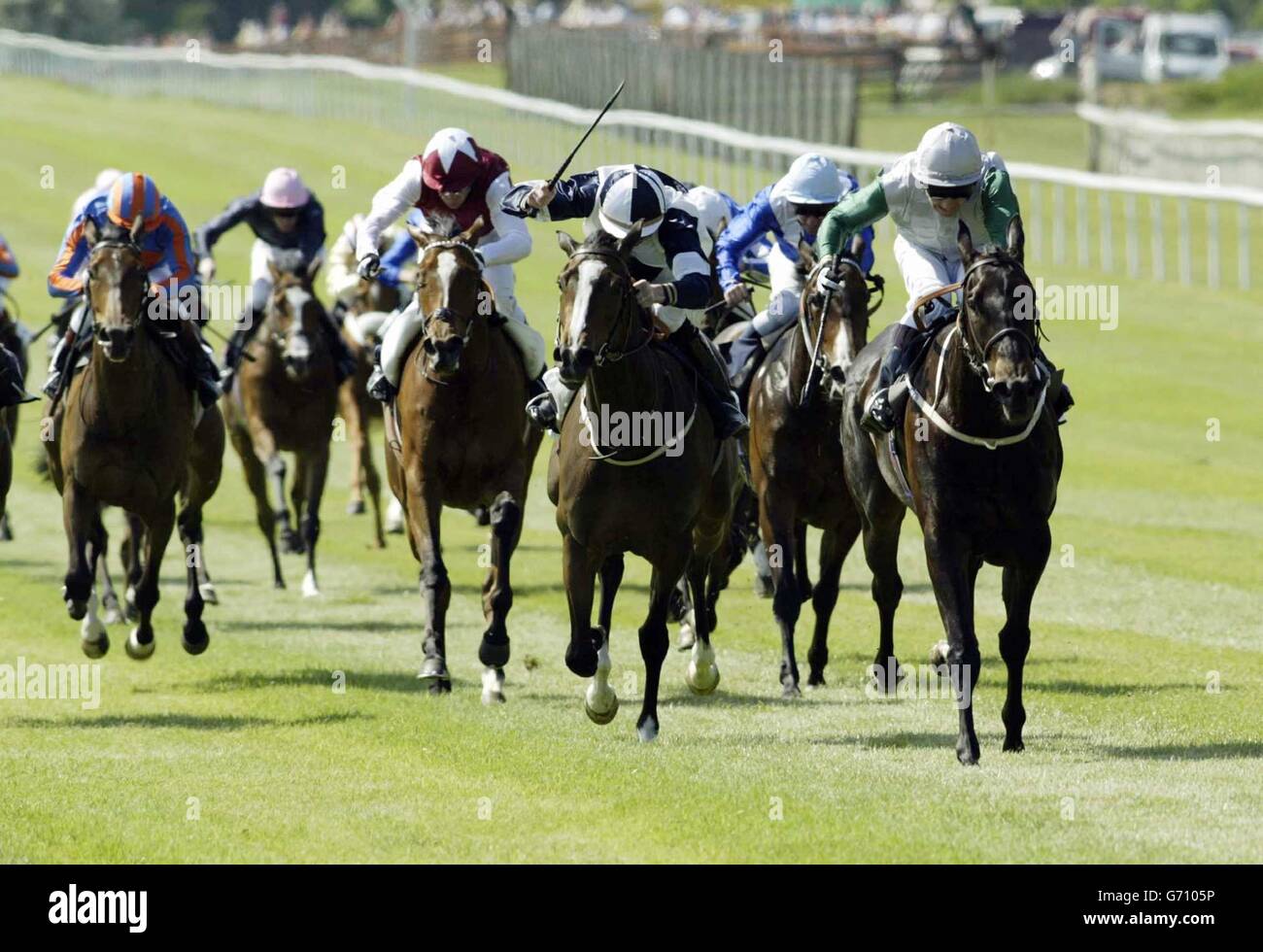 Attraction ridden by jockey Kevin Darley (far right) wins ahead of Alexander Goldrun ridden by jockey Kevin Manning (centre) in the Boylesports Irish 1000 Guineas at the Curragh. Stock Photo