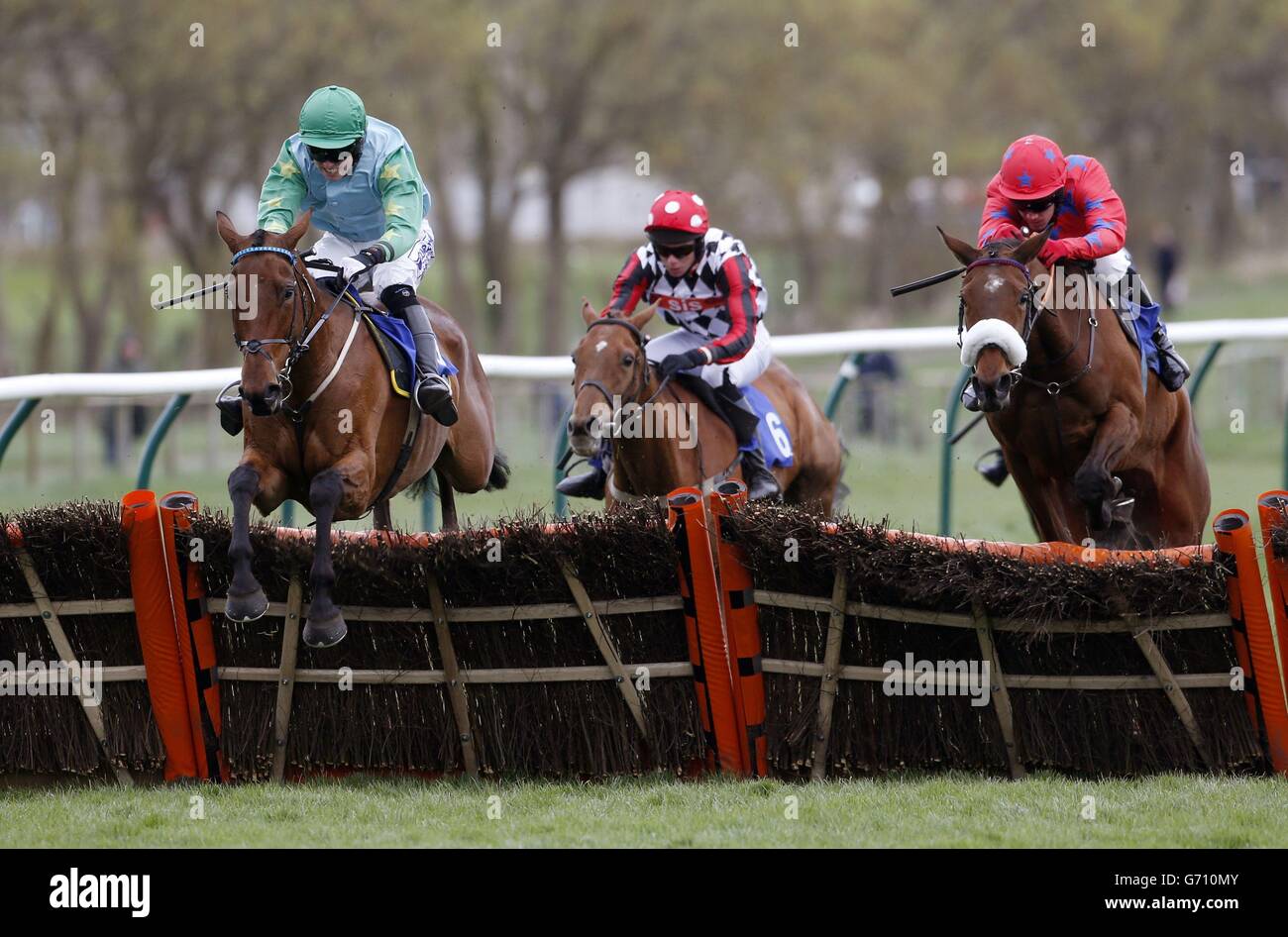 Jockey Donal Devereux riding Land of Vic (left) wins the The Coral