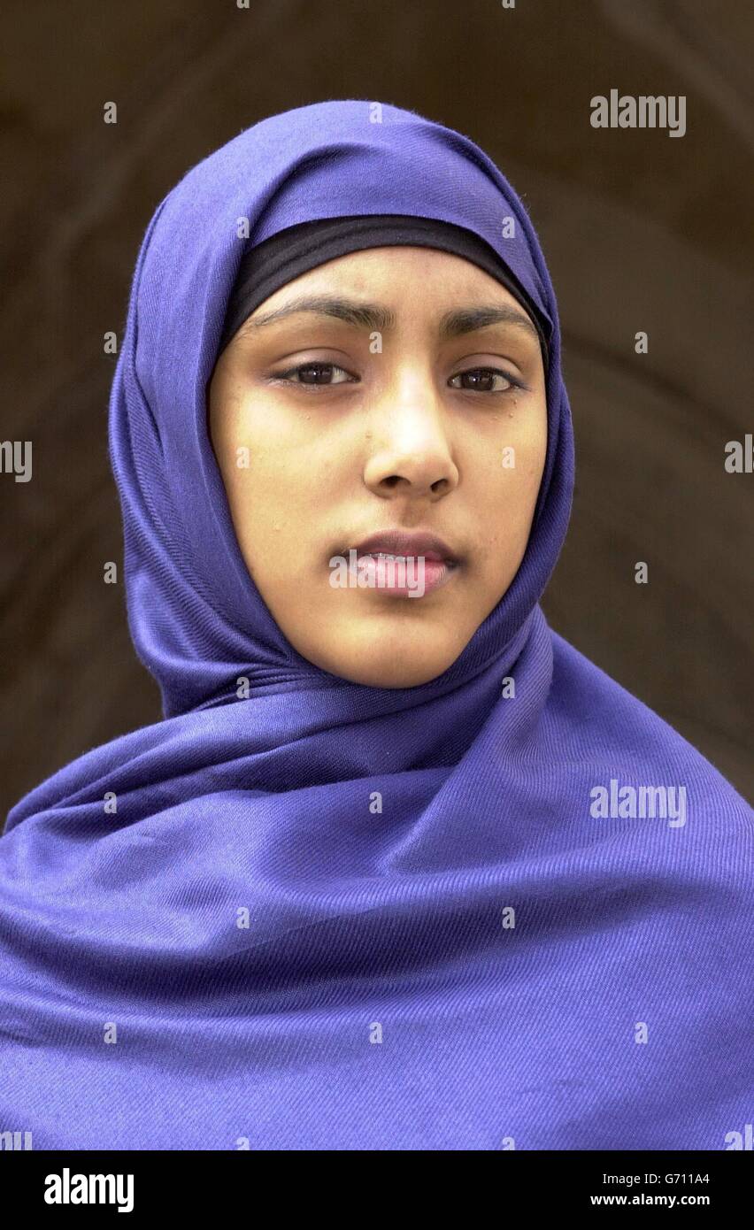 Shabina Begum, aged 15, at the High Court in London where she is fighting to be allowed to wear her jilbab, the traditional head wear of her faith, at school. Shabina is not allowed to attend Denbeigh High School, in Luton, while she is wearing the headscarf. *15/06/04: Shabina Begum the 15-year-old schoolgirl was learning whether she has won her High Court battle for the right to wear strict Muslim dress in the classroom. At a recent hearing, lawyers for the head teacher and governors of Denbigh High School, Luton, raised fears that a win for Shabina Begum could cause unwelcome divisions Stock Photo