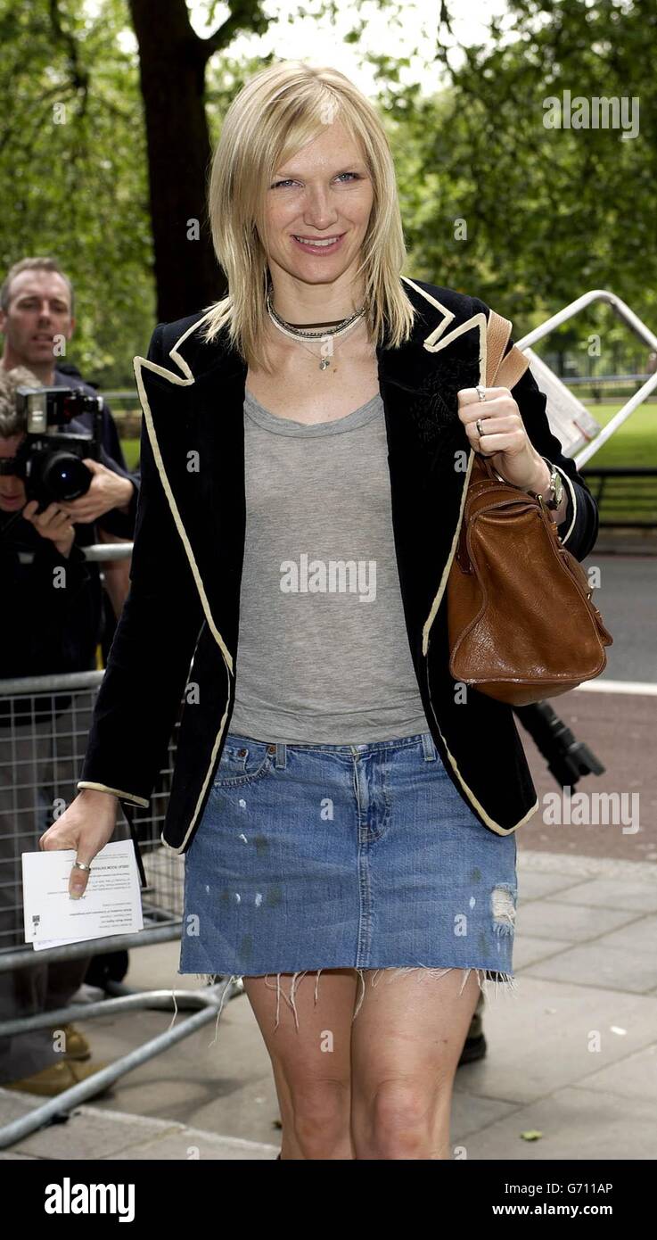 Radio One DJ Jo Whiley arrives for the Ivor Novello Awards at the Grosvenor House hotel on Park Lane in central London. The 49th annual awards honour the best songs and film scores of 2003. Stock Photo