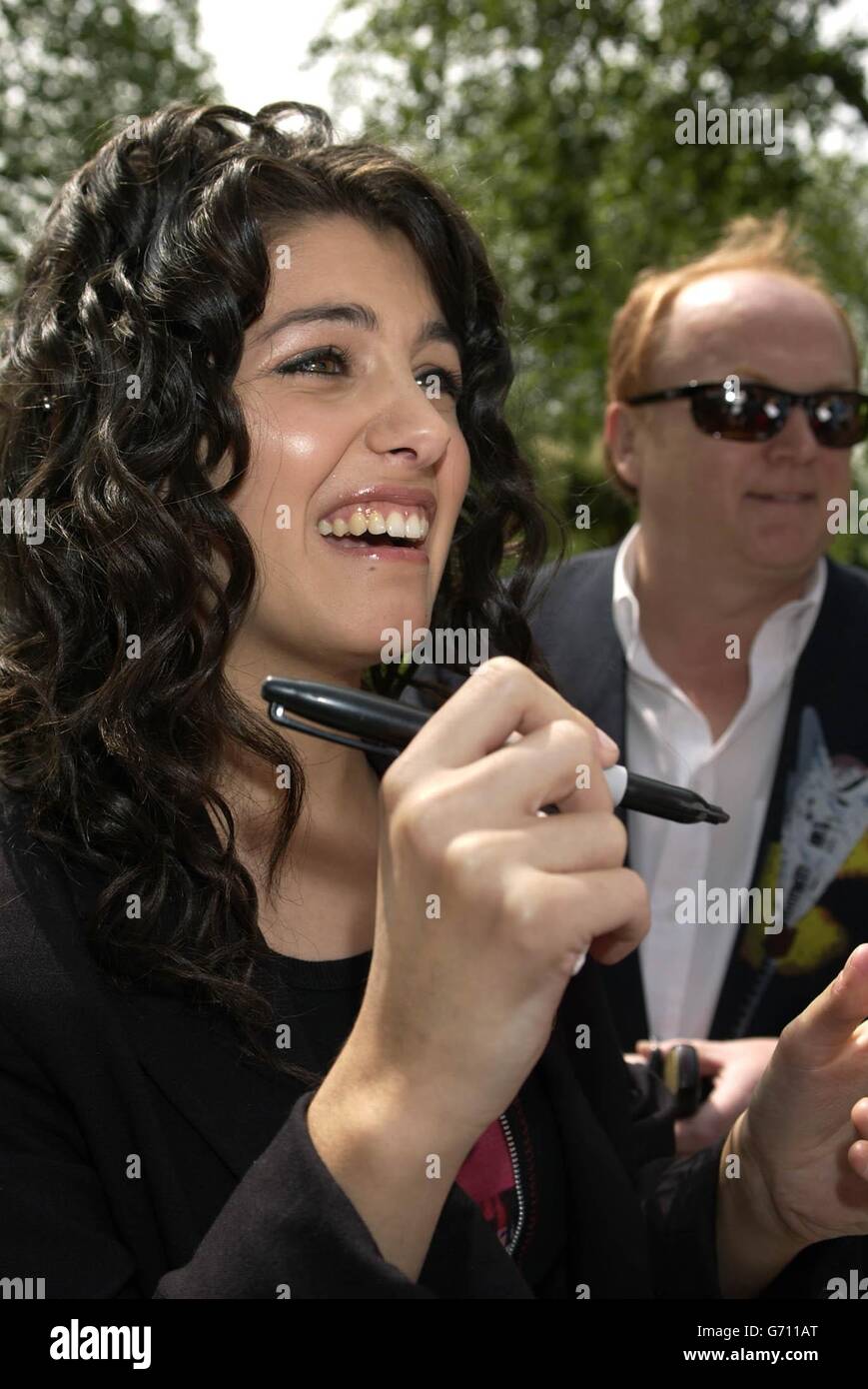 Singer Katie Melua arrives for the Ivor Novello Awards at the Grosvenor House hotel on Park Lane in central London. The 49th annual awards honour the best songs and film scores of 2003. Stock Photo