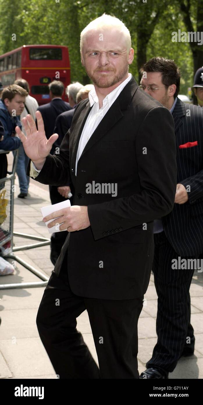 Actor Simon Pegg arrives for the Ivor Novello Awards at the Grosvenor House hotel on Park Lane in central London. The 49th annual awards honour the best songs and film scores of 2003. Stock Photo