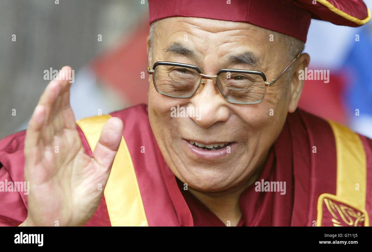 The Dalai Lama recieves an honorary Fellowship from Liverpool John Moores University at the citys Anglican Cathedral Stock Photo