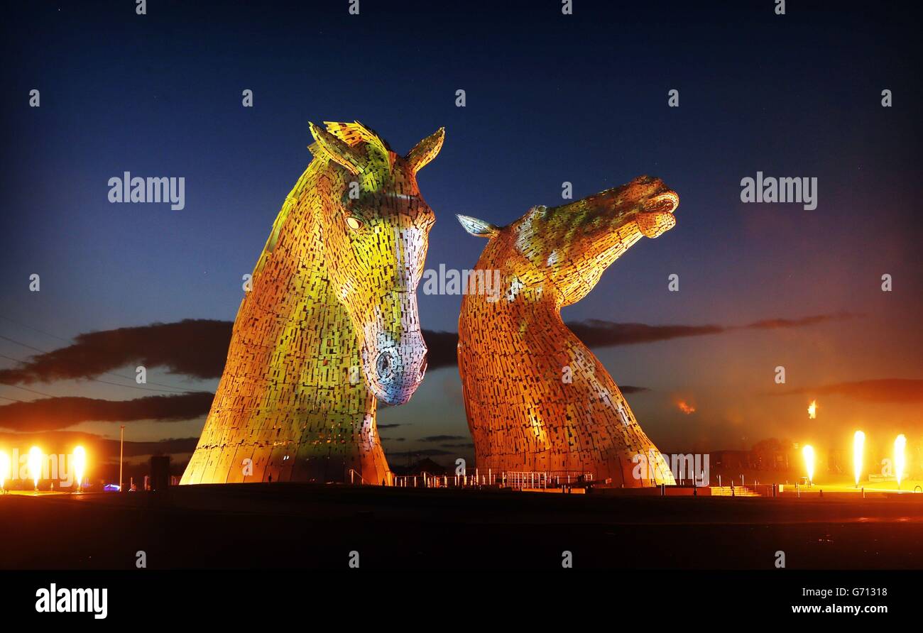 Groupe F perform a light, flame and sound show during the launch of The Kelpies sculpture by Andy Scott at Helix Park in Falkirk, Scotland. Stock Photo
