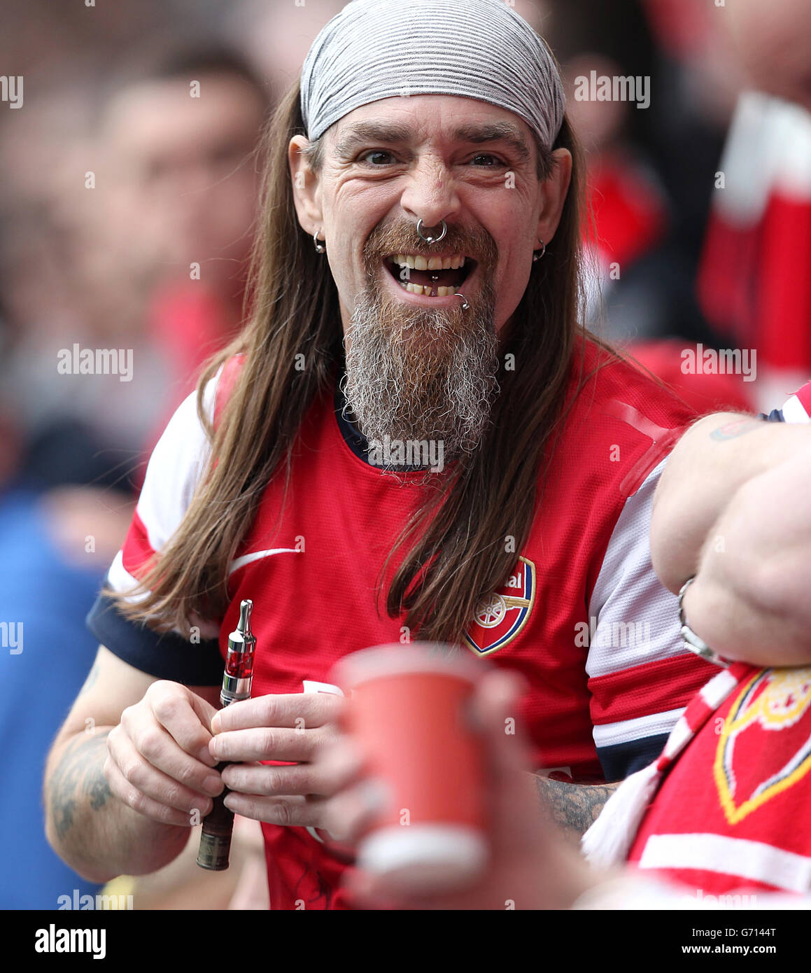 Soccer - Barclays Premier League - Hull City v Arsenal - KC Stadium. An Arsenal fan in the stands Stock Photo