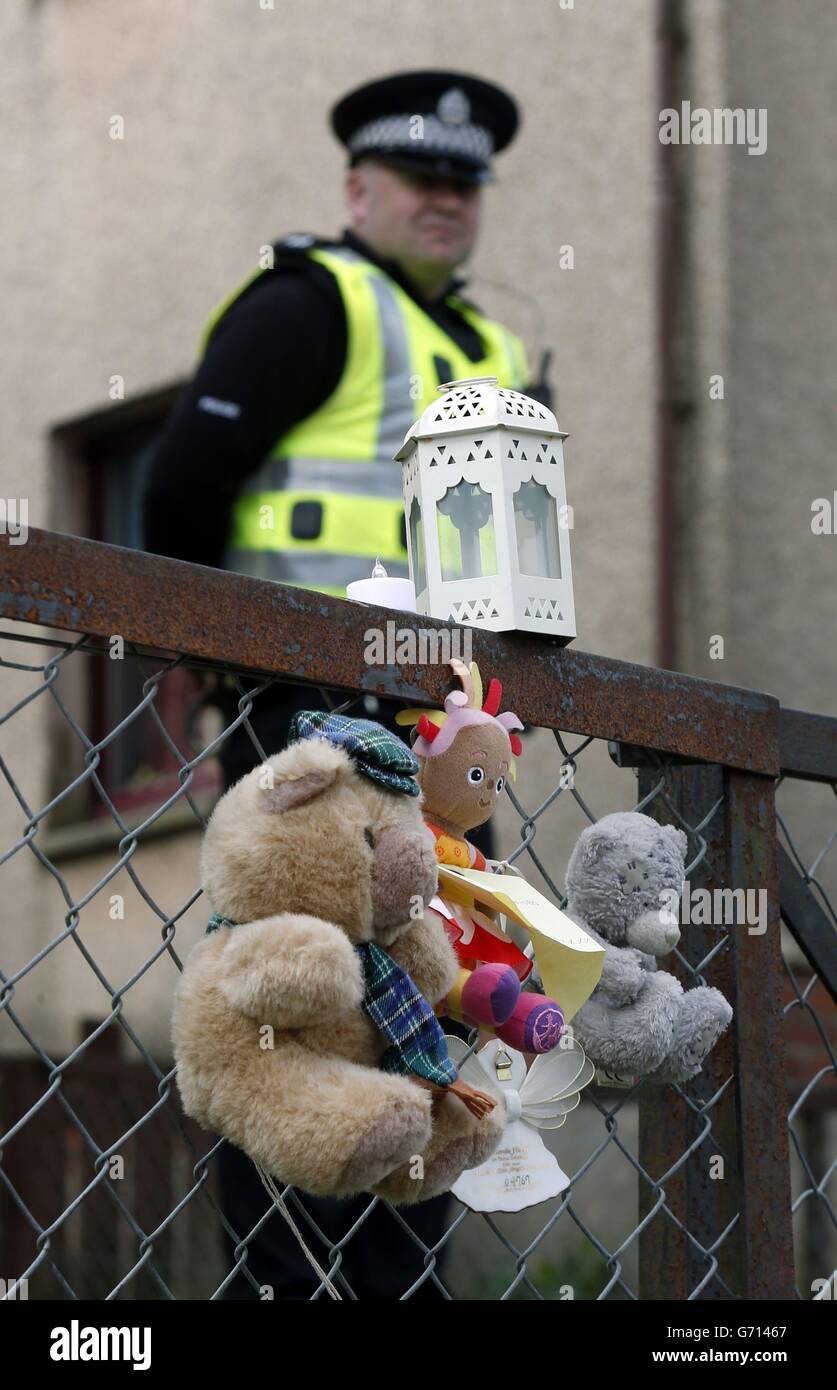 Tributes left for a two-year-old, whose death is being treated as suspicious, outside a property in Croftangry Road in Kelty, Fife. Stock Photo