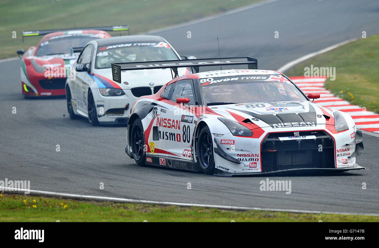 Motor Racing - Avon Tyres British GT Championship - Races 1 and 2 - Oulton Park. Nissan GT Academy Team's Sir Chris Hoy (right) during Race One of the Avon Tyres British GT Championship at Oulton Park, Cheshire. Stock Photo