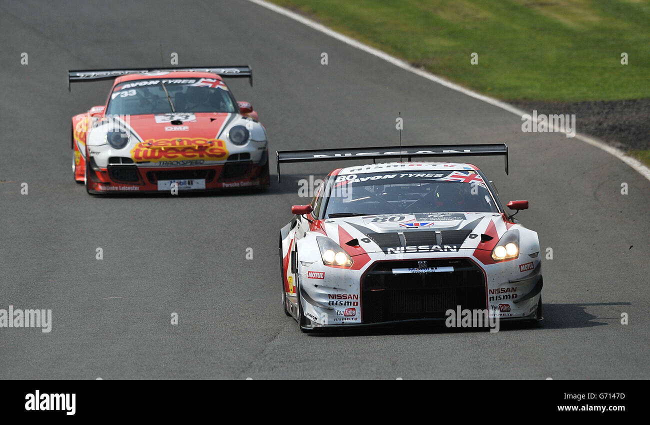 Nissan GT Academy Team's Sir Chris Hoy (right) during Race One of the Avon Tyres British GT Championship at Oulton Park, Cheshire. Stock Photo