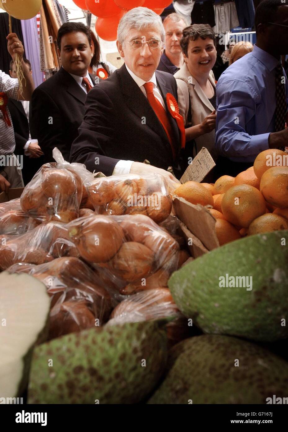 Foreign Secretary Jack Straw looks at the produce in Brixton Market, London, while campaigning on behalf of the government for the local, European and London mayoral elections tomorrow. Mr Straw hailed the postal voting experiment a success. Stock Photo