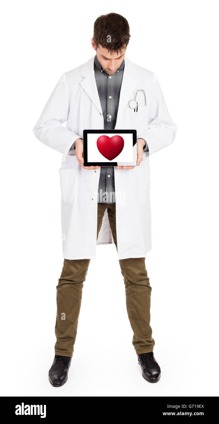 Doctor holding tablet, isolated on white - Red heart Stock Photo - Alamy