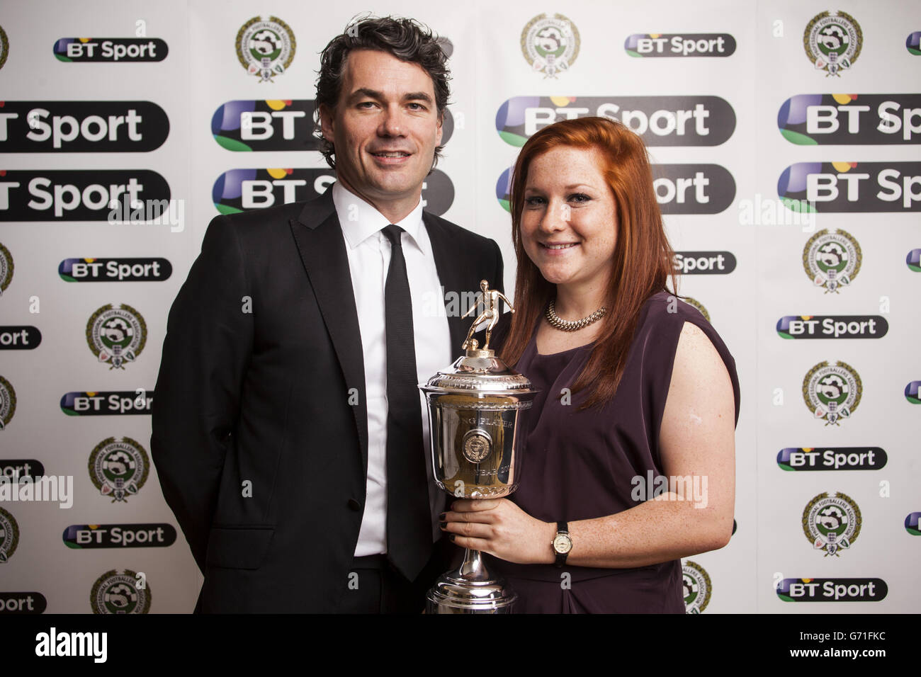 Liverpool Ladies Martha Harris receives the PFA Young Player Of The Year Award, alongside BT Group Chief Executive Gavin Patterson, during the PFA Player of the Year Awards at the Grosvenor Hotel, London. Stock Photo