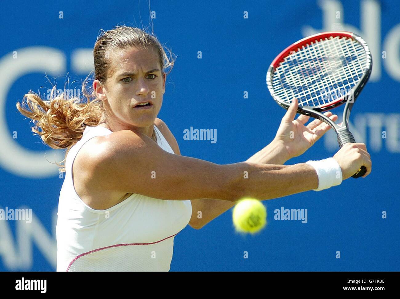 Amelie Mauresmo of France in action against Great Britain's Amanda Janes  during the Hastings Direct International Championships in Eastbourne, West  Sussex, Wednesday June 16, 2004. Mauresmo won in straight sets 6:4, 6:2  Stock Photo - Alamy