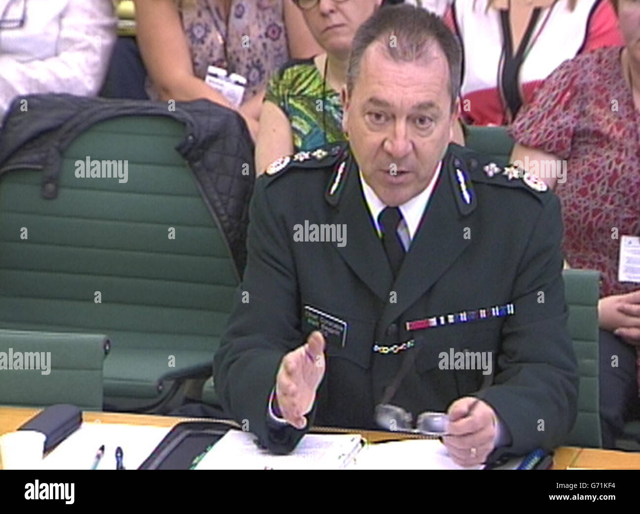 Northern Ireland's chief constable Matt Baggott gives evidence inside the House of Commons in central London, to the ongoing Northern Ireland Affairs Committee inquiry into the contentious on-the-run (OTR) administrative process, agreed between Sinn Fein and the last Labour government, which saw letters sent to about 190 republicans informing them they were not being sought by the authorities in the UK. Stock Photo