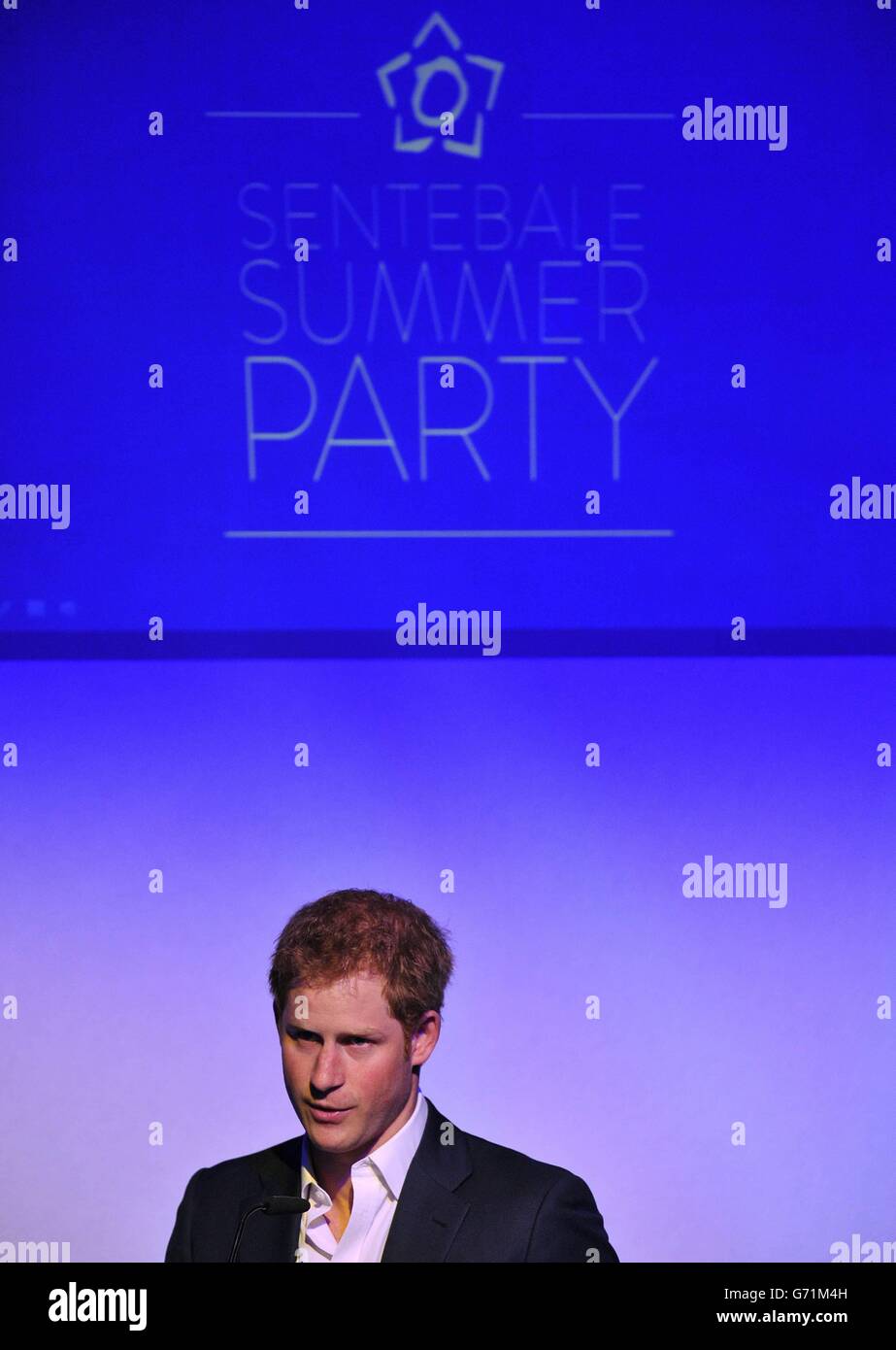 Prince Harry delivers a speech at the summer party to mark the 10th anniversary of Sentebale charity at the Dorchester Hotel, London. Stock Photo