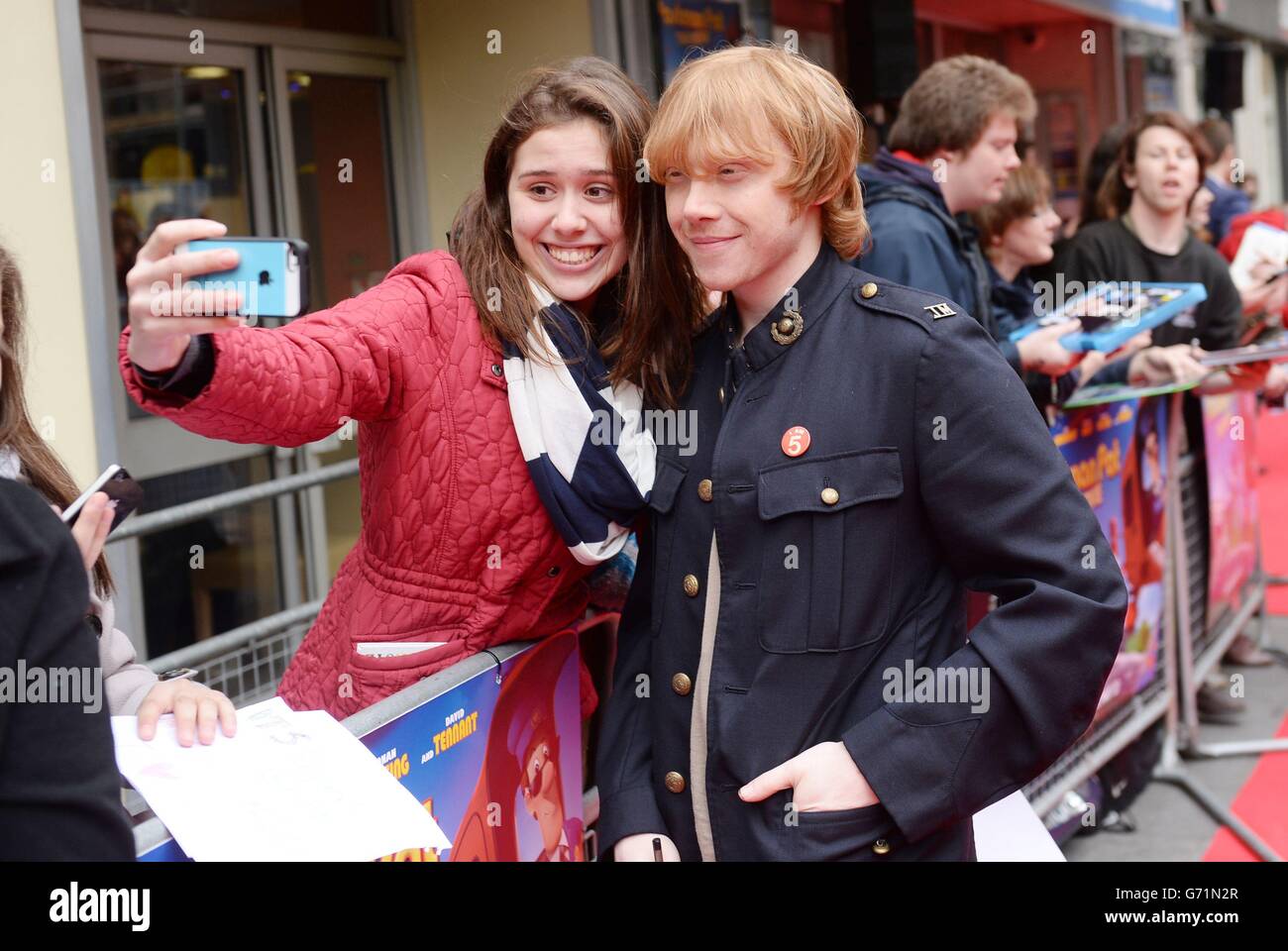 Rupert Grint who plays Josh arrives for the premiere of Postman Pat: The Movie at the Odeon, West End, London. Stock Photo