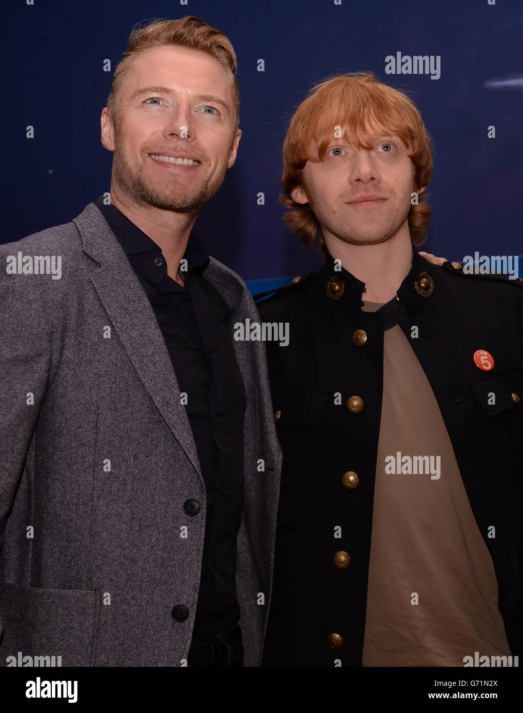 Ronan Keating and Rupert Grint arrive for the premiere of Postman Pat: The Movie at the Odeon, West End, London. Stock Photo