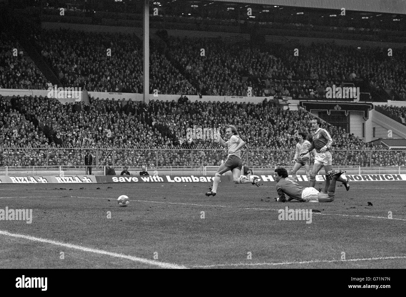 David Peach (left) turns Nottingham Forest goalkeeper Peter Shilton (on ground) to give Southampton the lead in the 16th minute of the Football League Cup final at Wembley. Stock Photo