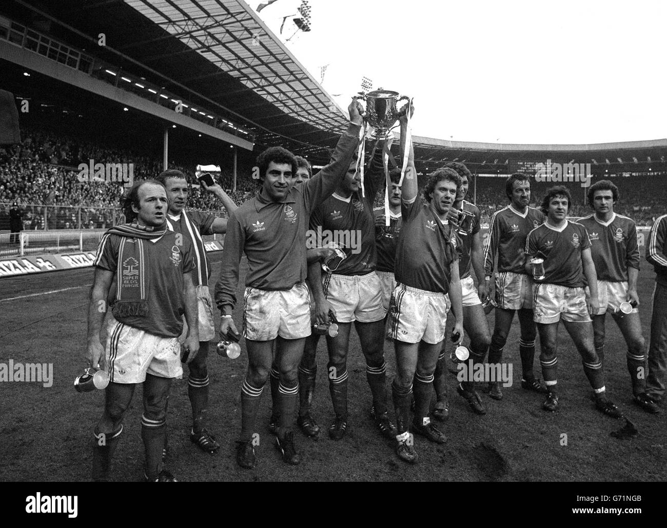 Nottingham Forest parading the League Cup at Wembley after they retained the trophy with a 3-2 victory over Southampton. Forest players are (from left) Archie Gemmill, John McGovern, Peter Shilton, Colin Barrett, Larry Lloyd, Garry Birtles, Tony Woodcock, Dave Needham, Frank Clark, John Robertson, and Martin O'Neill. Stock Photo