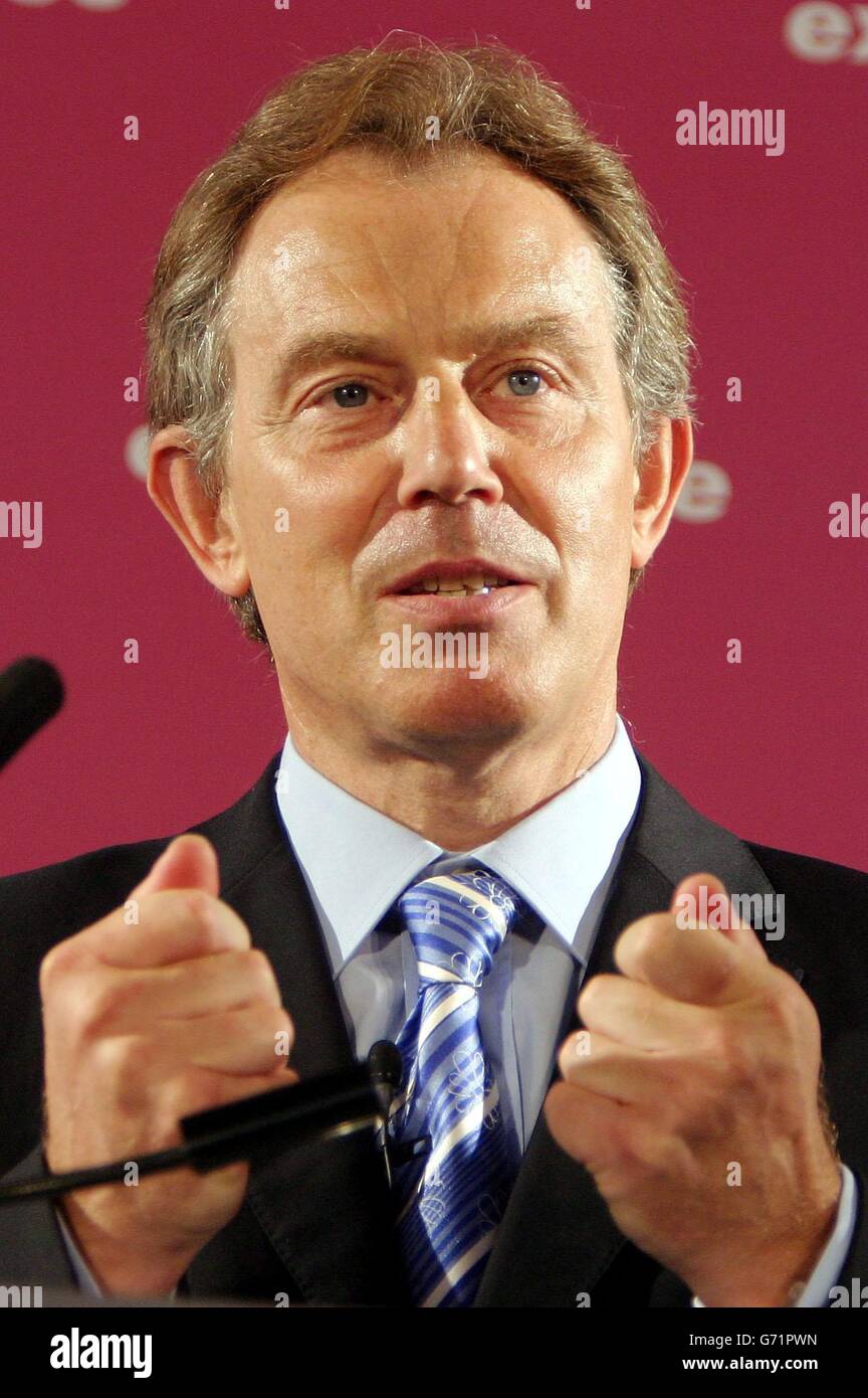 Britain's Prime Minister Tony Blair talks to staff at St Thomas