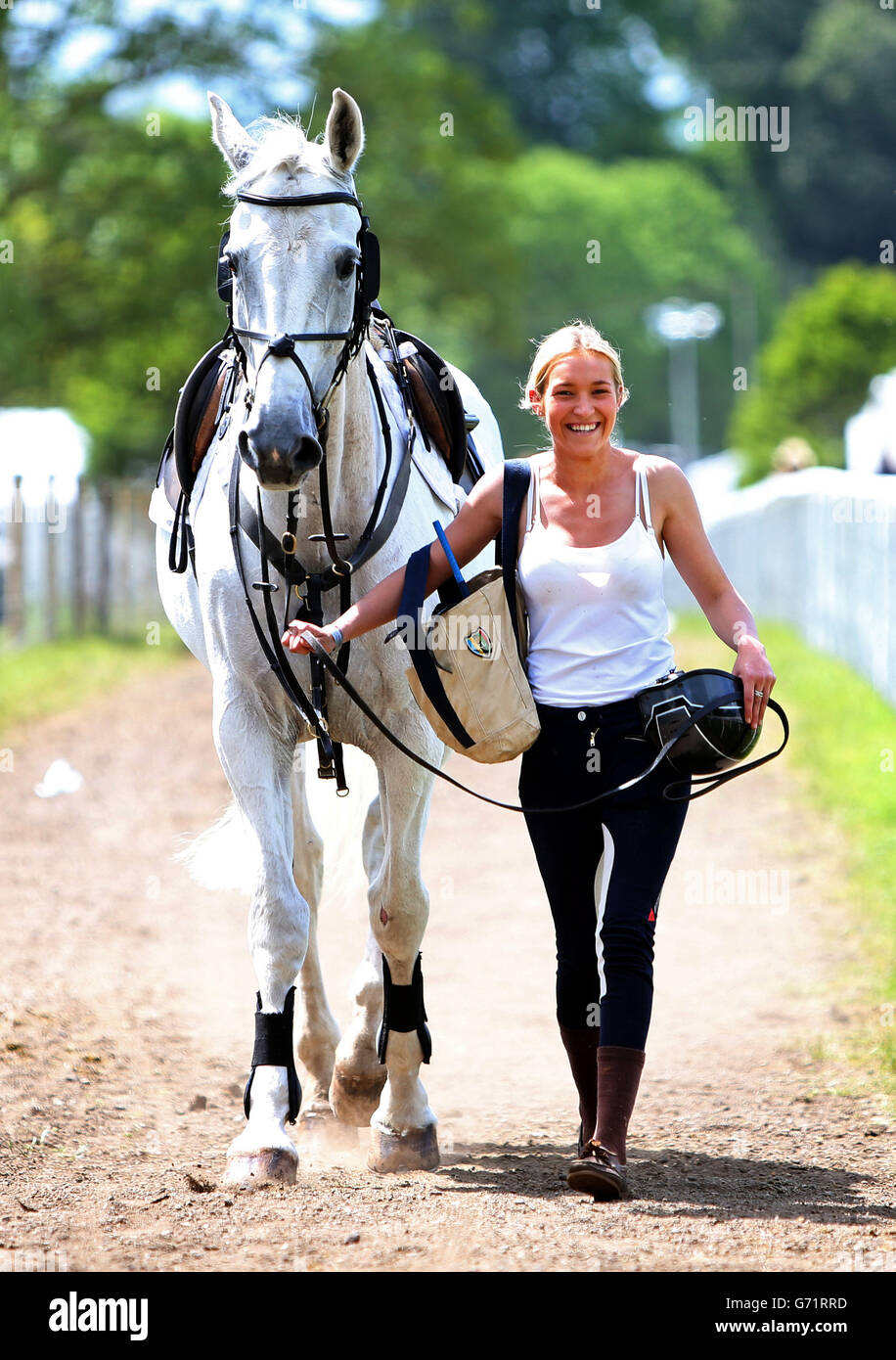 A Horse is lead back to the stables in the sunshine at the Royal