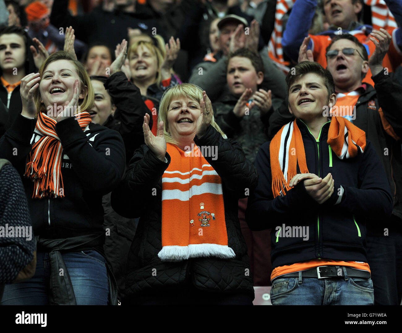 Blackpool fans celebrate at the end of the game hi-res stock ...