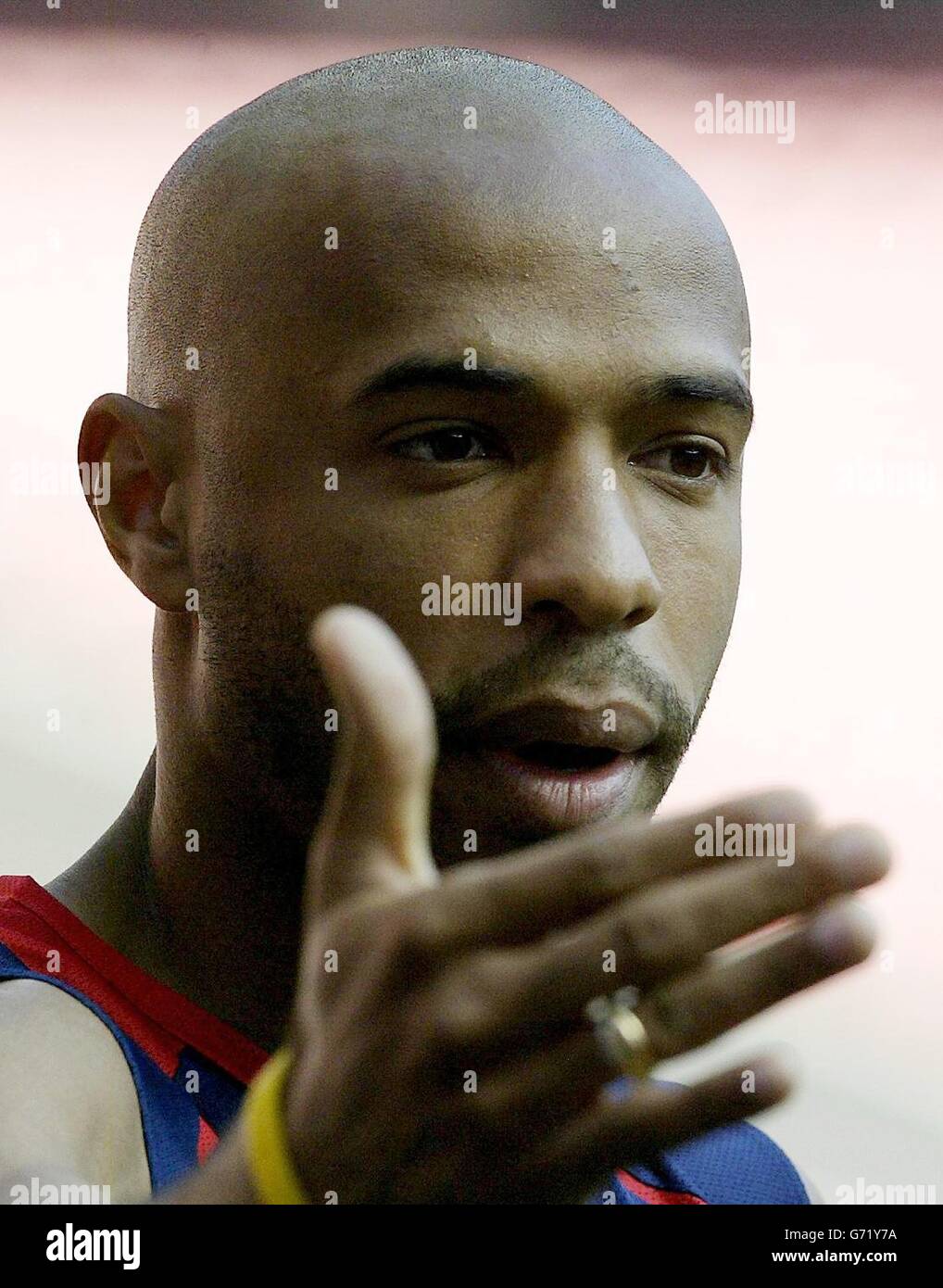 France's Thierry Henry during training on the Estadio da Luz in Lisbon, Portugal, Saturday June 12, 2004 in preparation for the Euro 2004 championship opening match against England tomorrow. Stock Photo