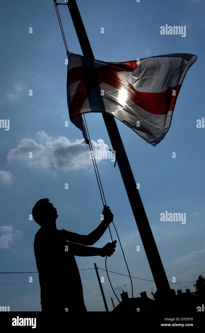 Pub flies flag at half mast Stock Photo