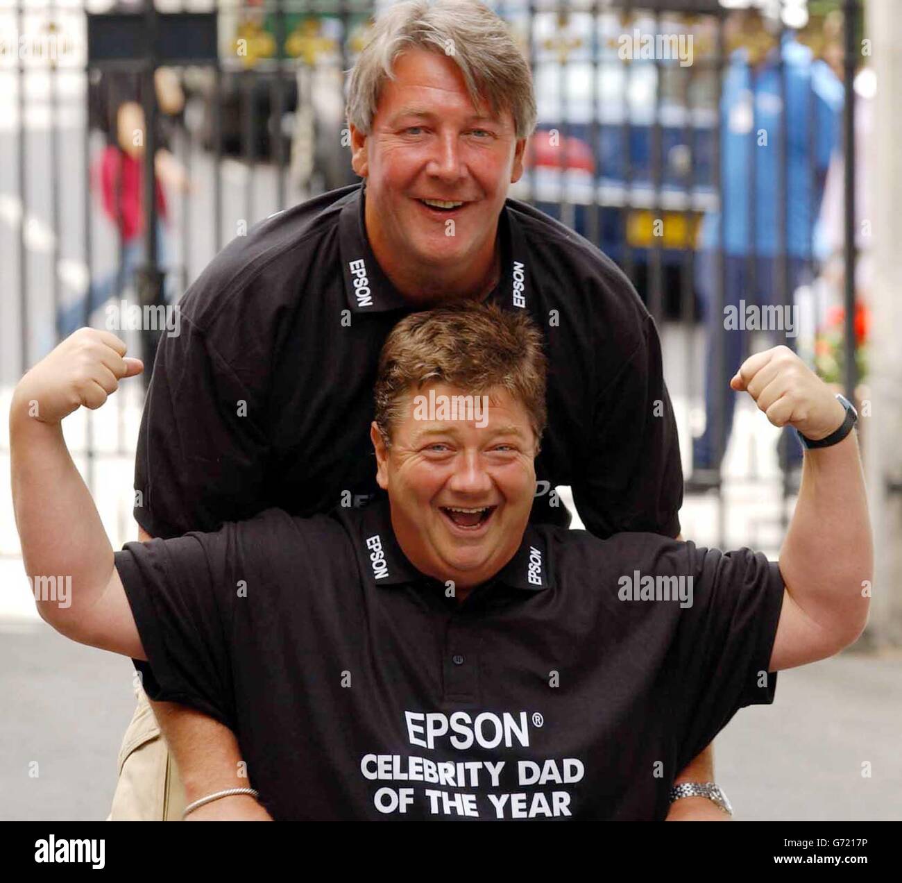 Ground Force presenter Tommy Walsh (left) and Heart FM DJ's Jono Coleman  during a photocall to celebrate their winning the Epsom Celebrity Dad of  the Year 2004, outside the Grovesnor House Hotel