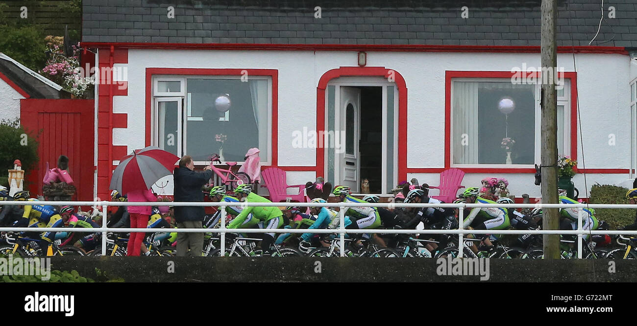 The Peloton travels along the North Antrim Coast during stage two of the 2014 Giro D'Italia, in Belfast. PRESS ASSOCIATION Photo. Picture date: Saturday May 10, 2014. Photo credit should read: Niall Carson/PA Wire Stock Photo