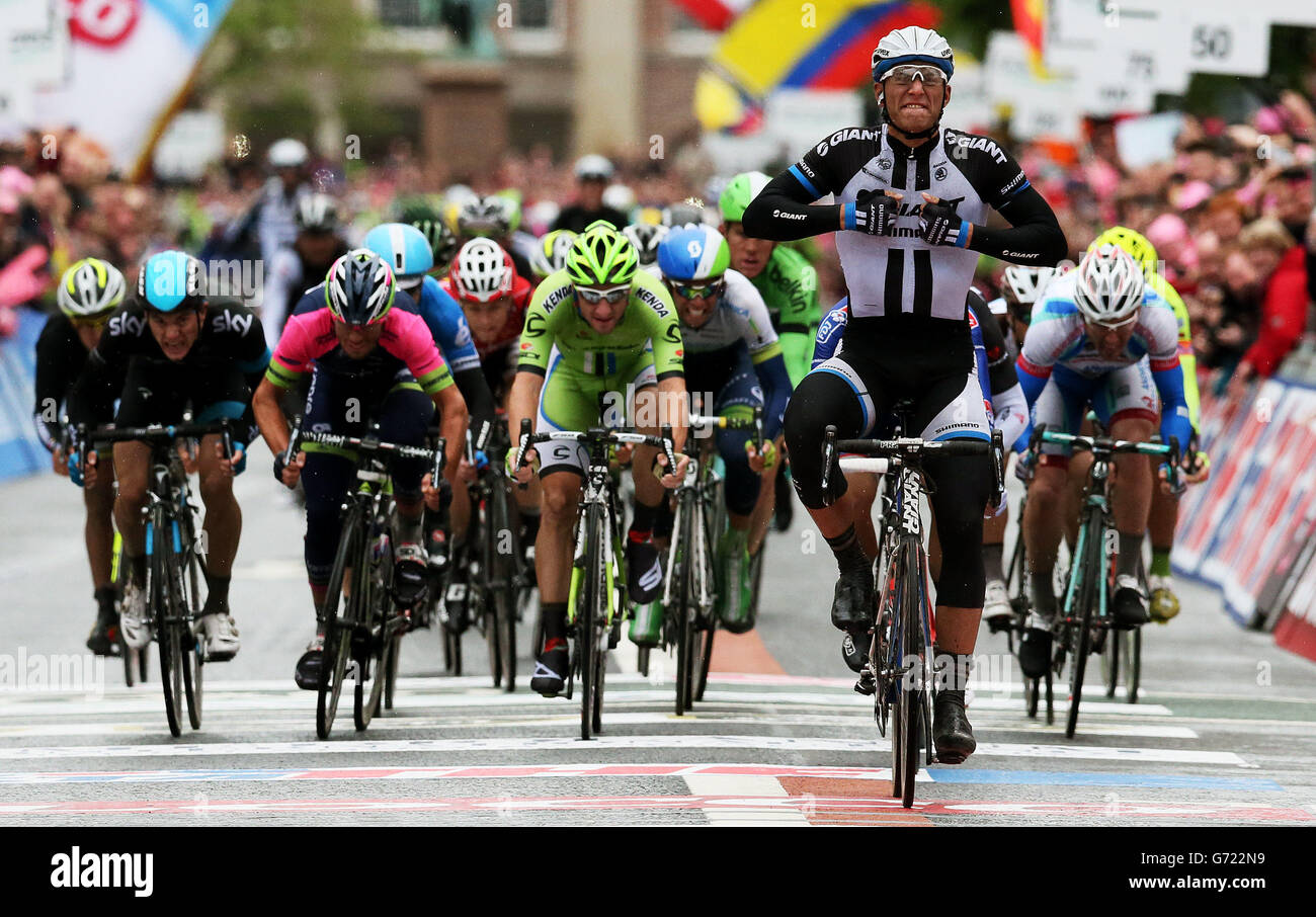 Giant-Shimano's Marcel Kittel celebrates as he crosses the finish line to win Stage two of the 2014 Giro D'Italia in Belfast. Stock Photo