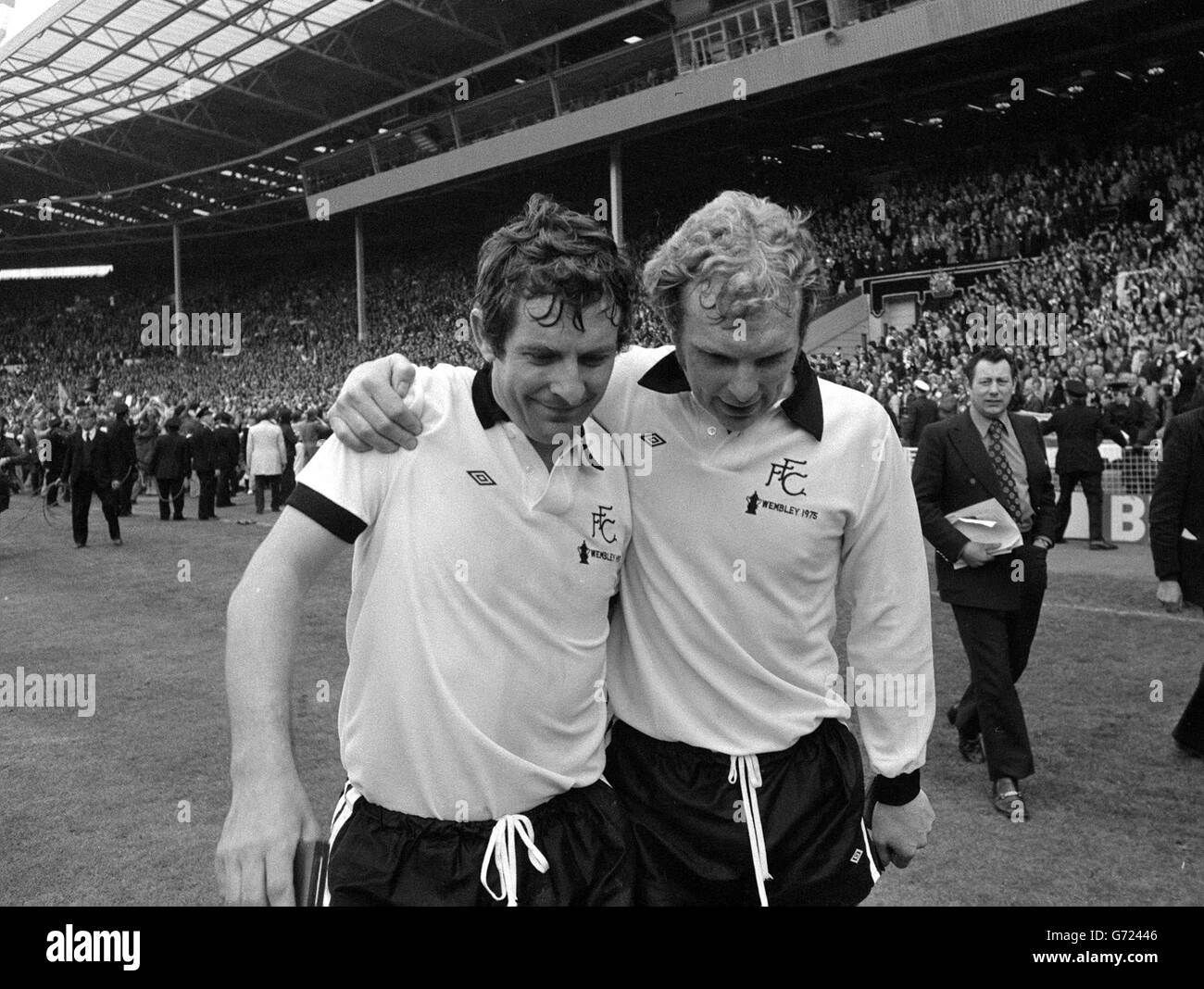 Fulham captain Alan Mullery (left) and Bobby Moore consoling each other after they were defeated 2-0 by West Ham United in the FA Cup final. Stock Photo