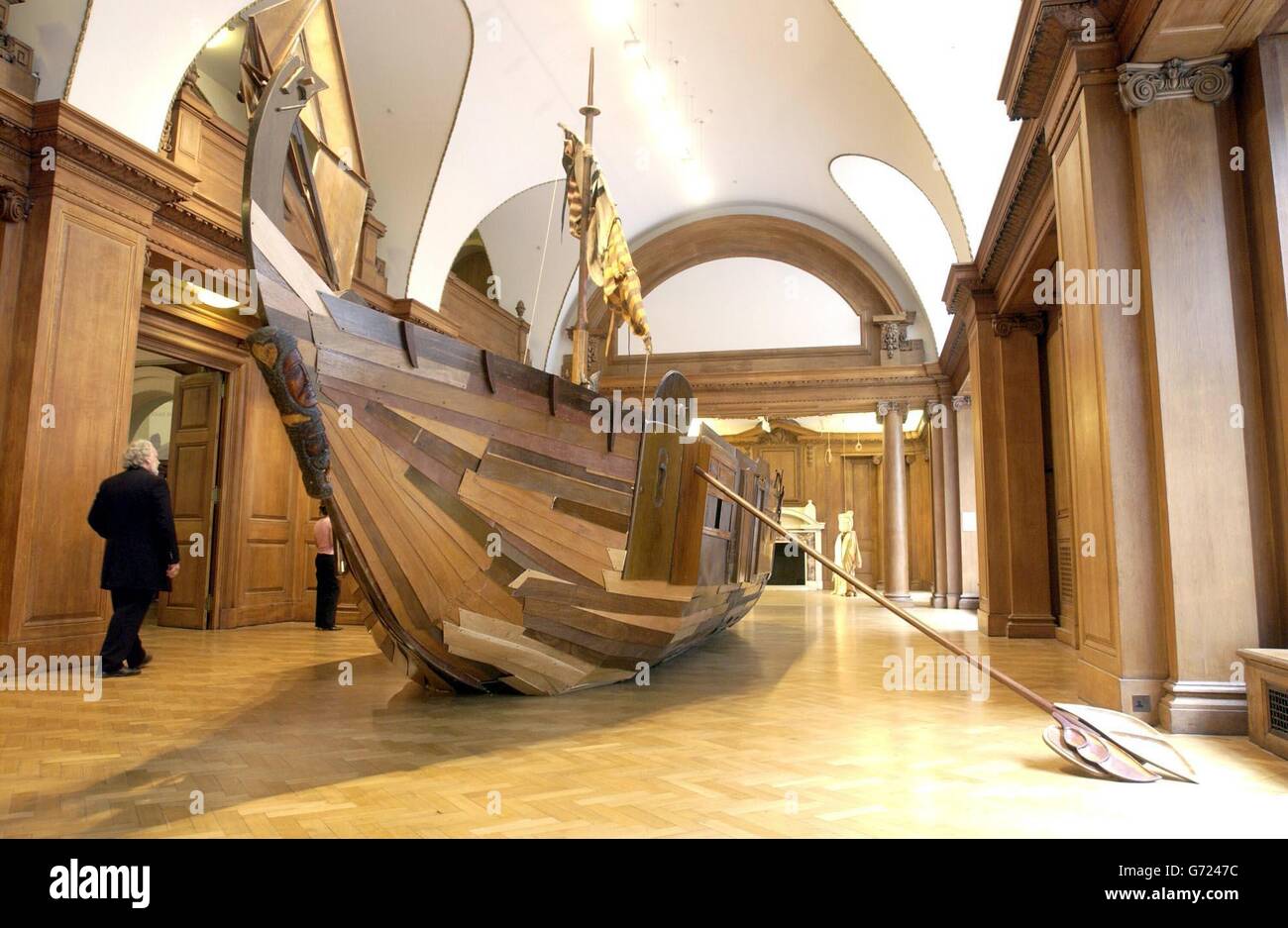 A Galleon entirely made from junk furniture at the Saatchi Gallery, County Hall, London. With an oar made from an old peanut tray, the cabin from an antique desk and the boat's structure from Victorian sideboards and Art Deco wardrobes, contemporary British Artist Brian Griffiths spent months scouring skips and markets for his creation, which was bought for 28,000 pounds by Charles Saatchi. Stock Photo