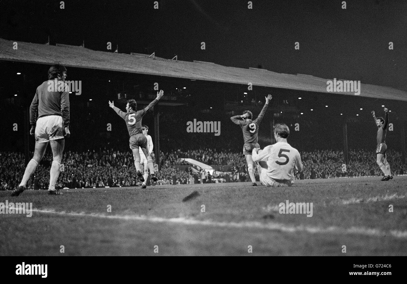Chelsea players Dempsey (5) and Hutchinson (9) celebrate David Webb's winning goal, in the FA Cup Final replay at Old Trafford, Manchester. Chelsea won 2-1 in extra time. Jackie Charlton of Leeds (5) is on the ground. Stock Photo