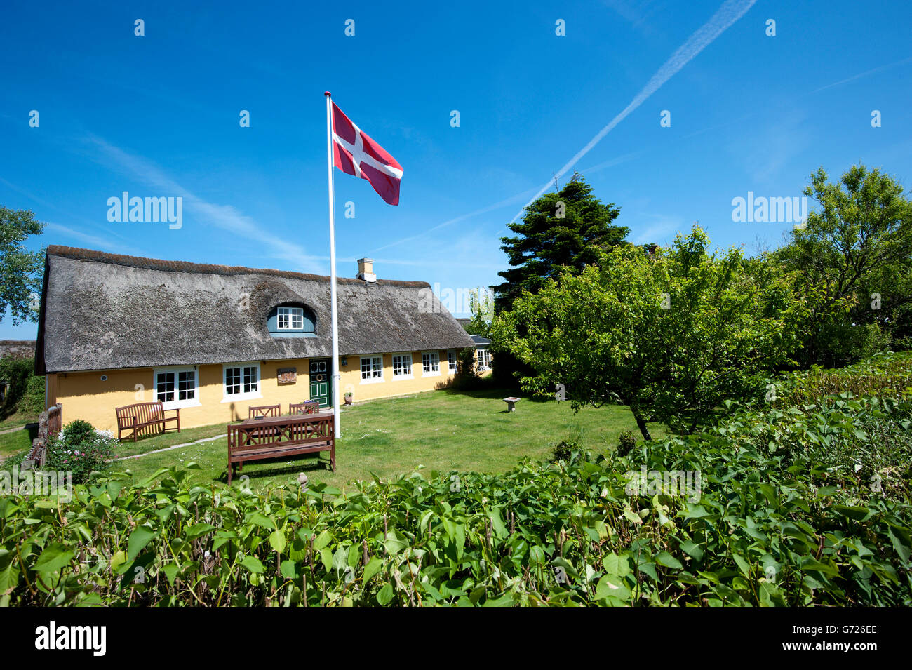 House and Danish flag in Sonderho, Fano island, Denmark, Scandinavia, Europe Stock Photo