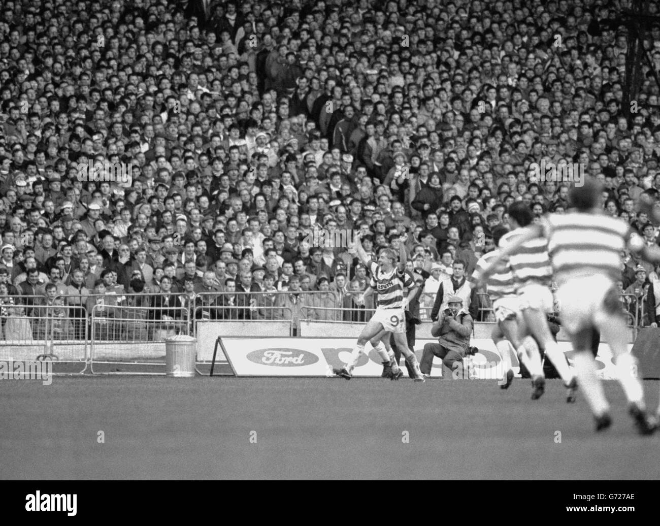 Frank McAvennie jubliant after scoring the first of his two goals for Celtic against Rangers during the Old Firm match at Parkhead. Celtic won 2-0 and have a seven point lead over Rangers at the top of the Scottish League Premier Division. Stock Photo