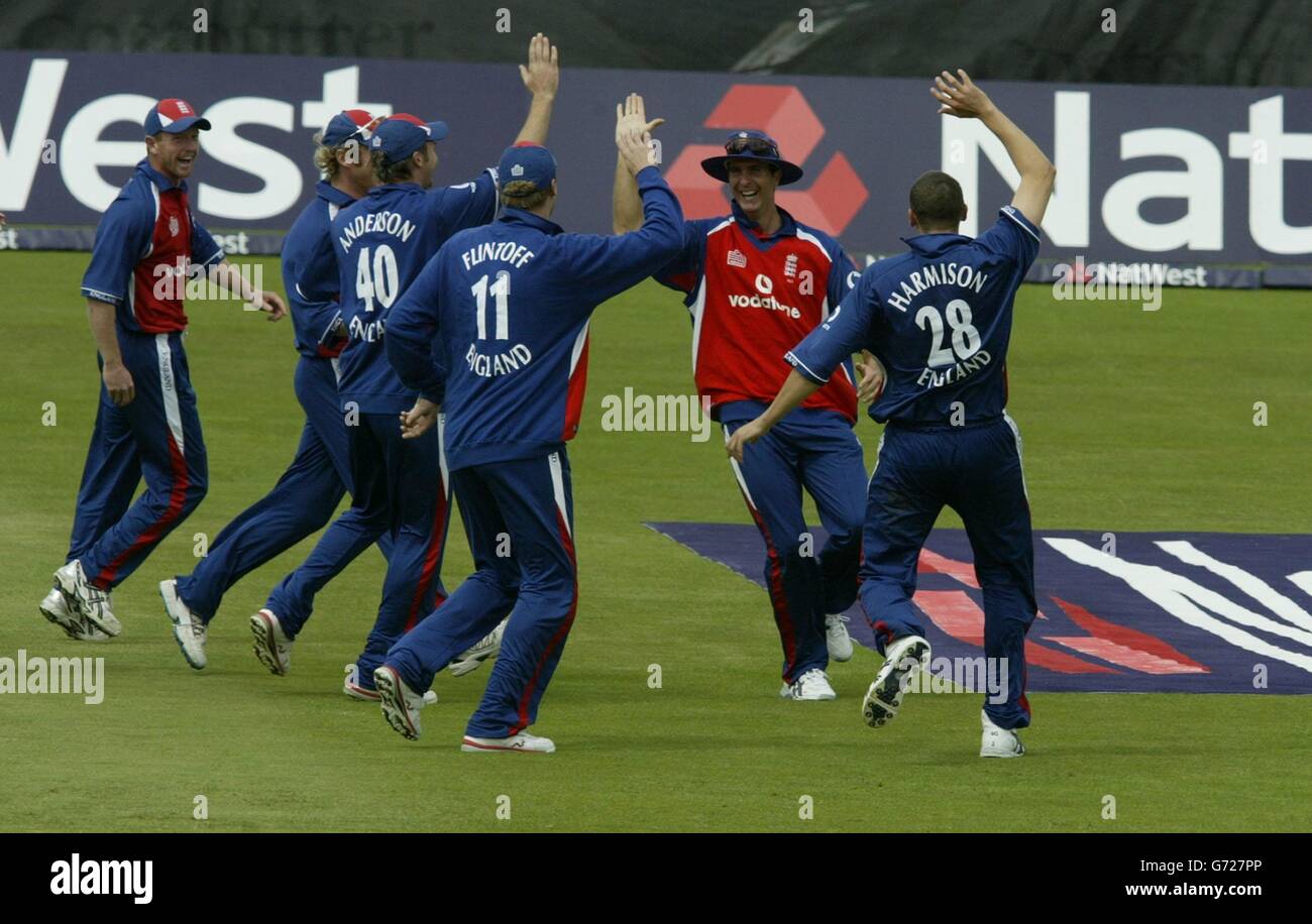 England players congratulate captain Michael Vaughan after he ran out West Indies opener Chris Gayle during the NatWest series match at Headingley. Stock Photo