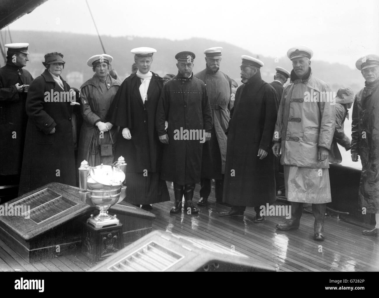 King George V, with Queen Mary and Princess Mary (centre), onboard the royal yacht 'Britannia' in Clyde during their visit to Scotland, 1920. Stock Photo