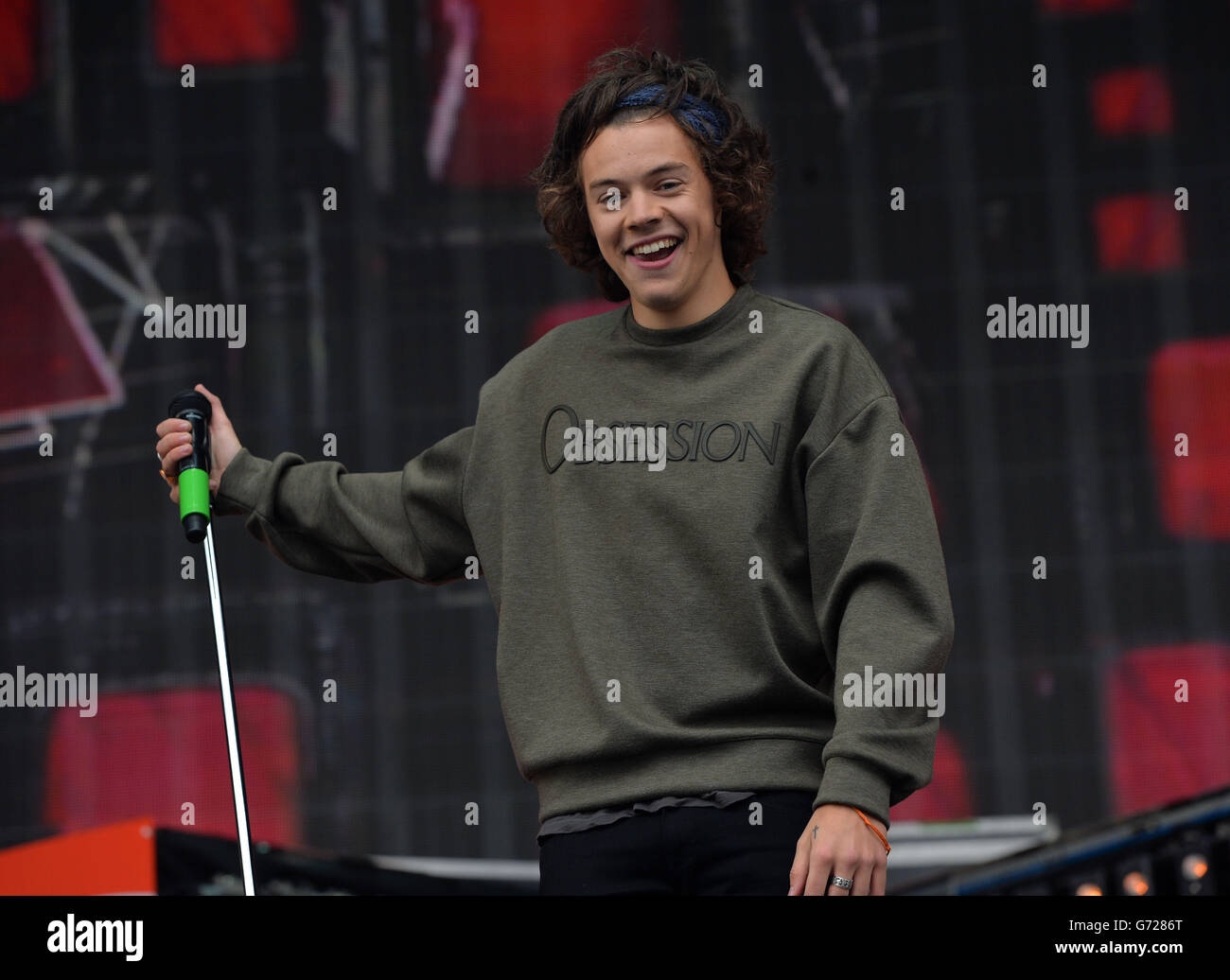 Harry Styles of One Direction performing on stage during Radio1's Big  Weekend at Glasgow Green in Glasgow Stock Photo - Alamy