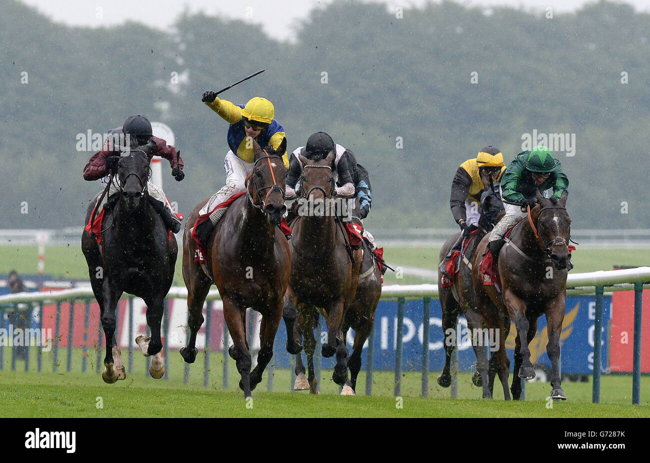 Bear Behind (second Left) ridden by Richard Kingscote, wins The Betfred Scoop6 £15 Million Today Handicap Stakes, during the Betfred Temple Stakes Raceday at Haydock Park Racecourse, Newton-le-Willows. Stock Photo