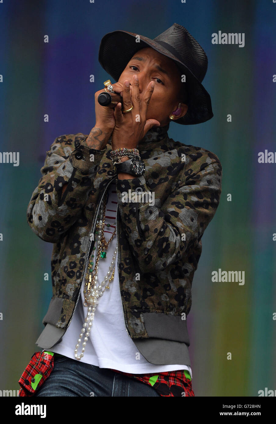 Pharrell Williams performing on stage during Radio 1's Big Weekend at Glasgow Green in Glasgow. PRESS ASSOCIATION Photo. Picture date: Saturday May 24, 2014. See PA story SHOWBIZ BigWeekend. Photo credit should read: Mark Runnacles/PA Wire Stock Photo