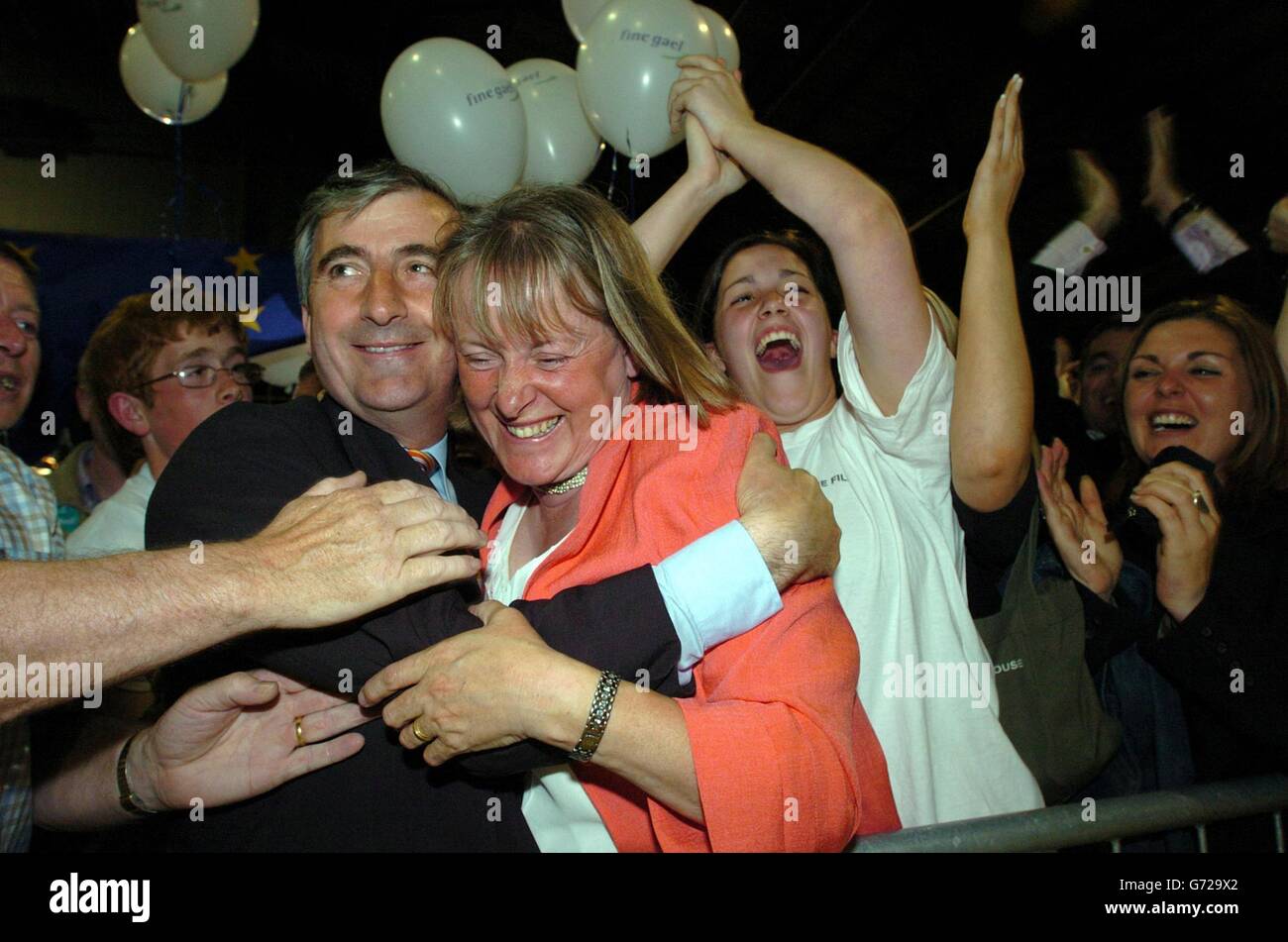 Fine Gael's Gay Mitchell hugs his wife Norma after winning a Dublin seat in the European Parliament, at Simmonds Court counting halls, Dublin, Ireland. Stock Photo