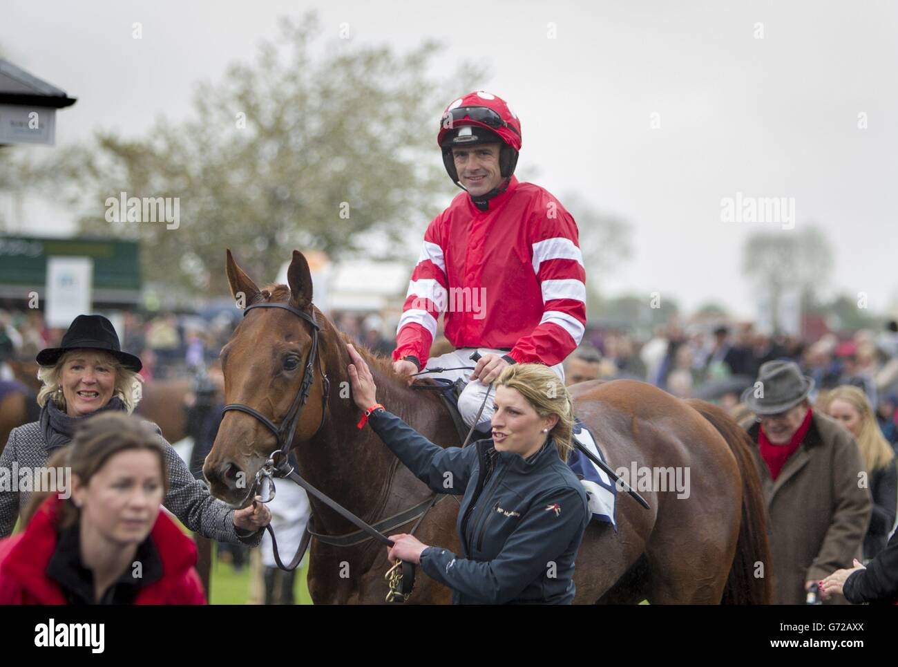 Ruby Walsh celebrates winning the The AES Champion Four Year Old Hurdle on Abbyssial during day