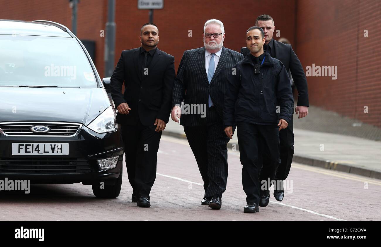 Disgraced former Cooperative Bank boss Paul Flowers (centre) arrives