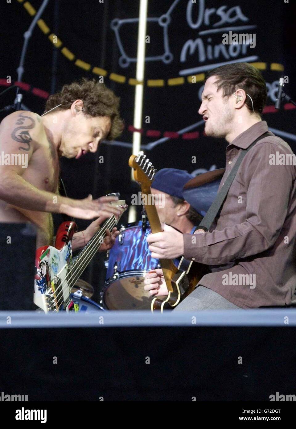 Flea (left) and John Frusciante from The Red Hot Chili Peppers performing onstage at Hyde Park in central London. Stock Photo