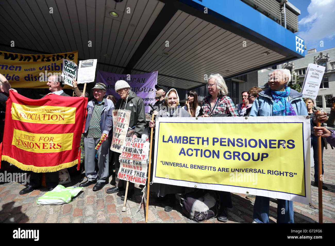 Protesters gather outside the Queen Elizabeth II Conference Centre in central London, during the Centrica AGM. Stock Photo