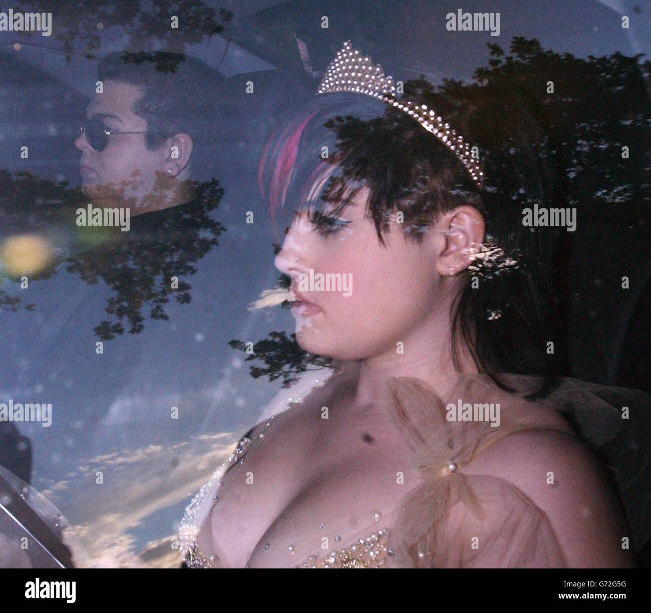 Singer Kelly Osbourne and her brother, Jack arrive for Sir Elton John's White Tie and Tiara Ball at his Berkshire mansion in Woodside, Crimp Hill, Old Windsor. All funds from the exclusive private party go to the Elton John AIDS Foundation. Stock Photo