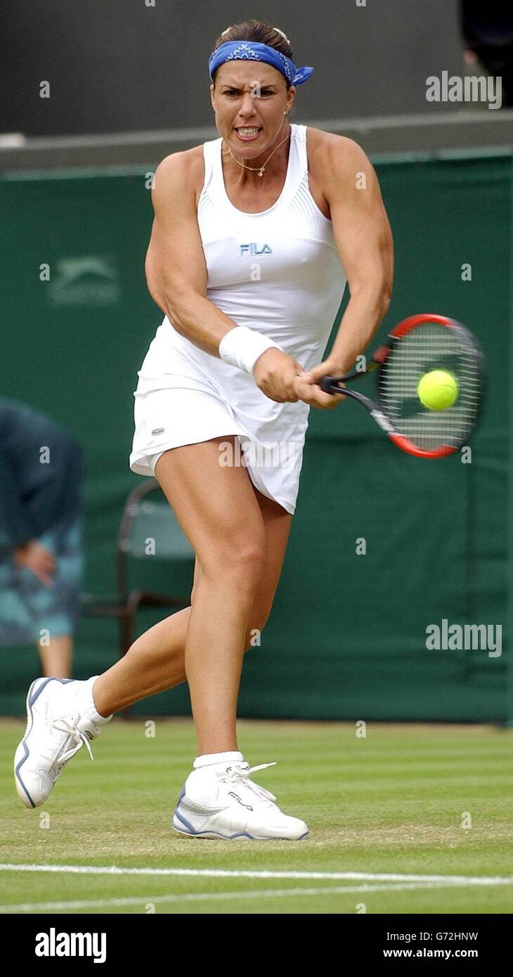 Jennifer Capriati from the USA in action against Nathalie Dechy from France  at the Lawn Tennis Championships in Wimbledon, London. EDITORIAL USE ONLY,  NO MOBILE PHONE USE Stock Photo - Alamy