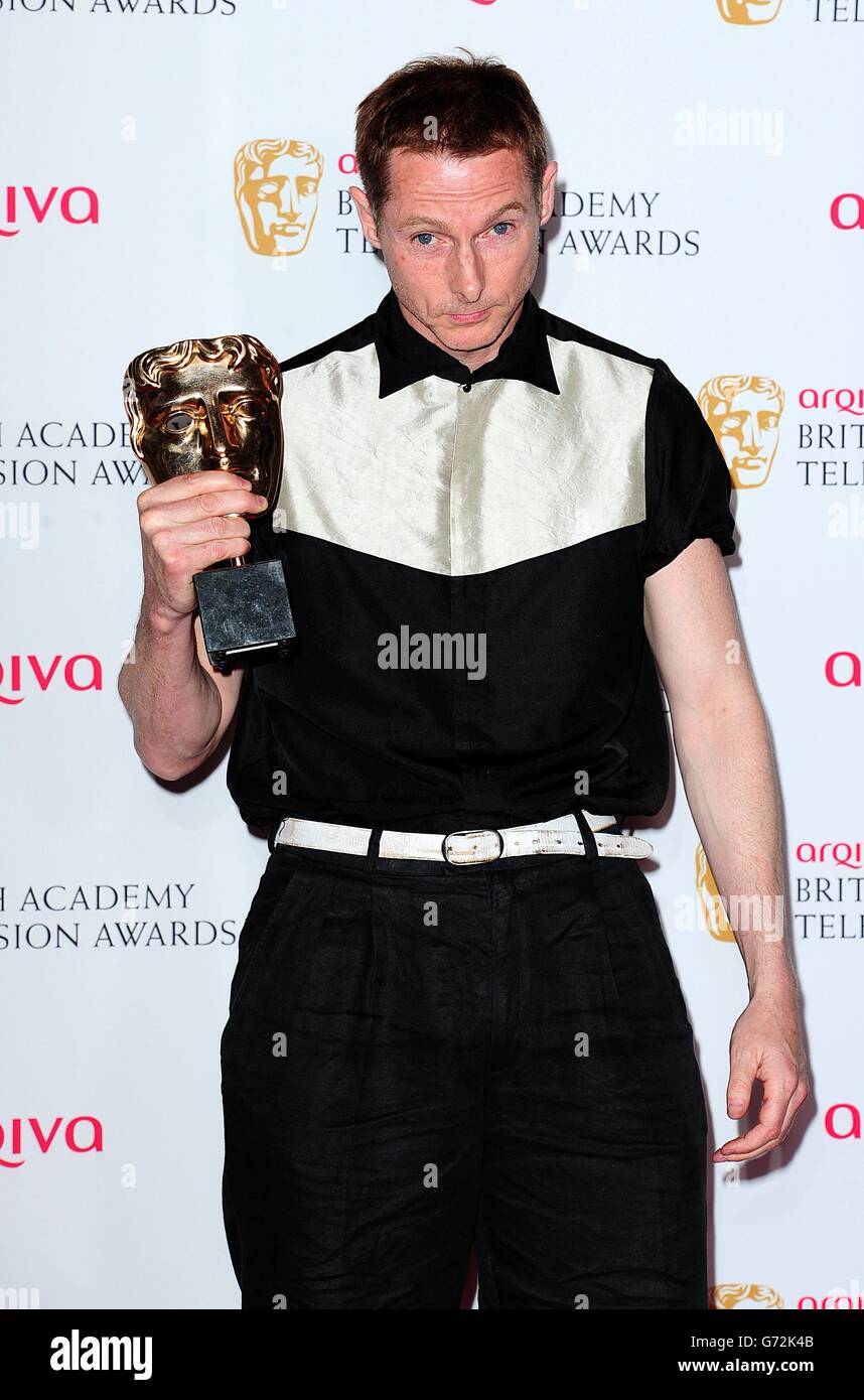 Sean Harris with the Leading Actor Award for Southcliffe, at the Arqiva British Academy Television Awards 2014 at the Theatre Royal, Drury Lane, London. Stock Photo