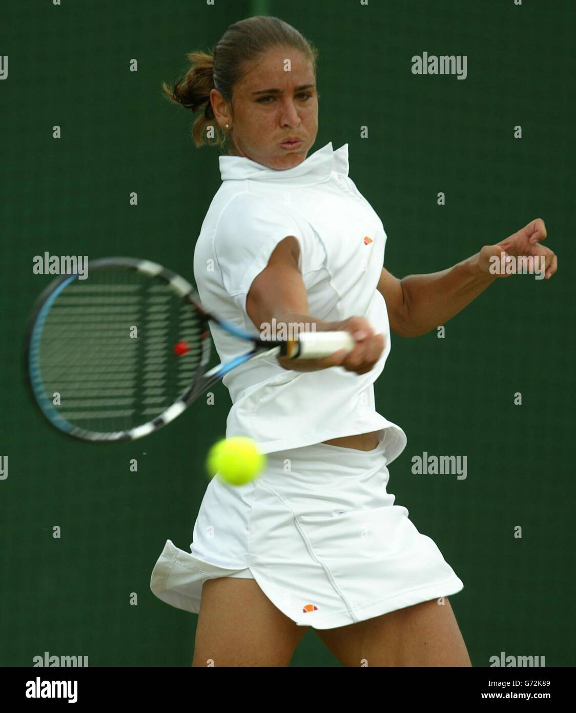 Rita Grande from Italy in action against Paola Suarez from Argentina in the  fourth round of the Ladies Single tournament of The Lawn Tennis  Championships at Wimbledon, London. EDITORIAL USE ONLY, NO
