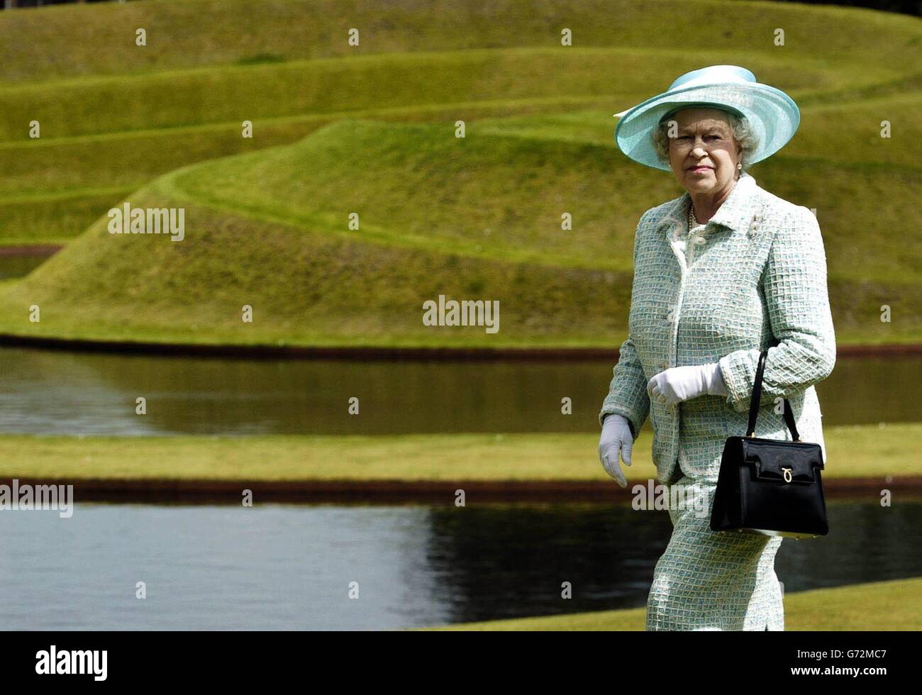 Britain's Queen Elizabeth II looks over the Landform sculpture at the Gallery of Modern Art in Edinburgh, on her last day of her week long trip to Scotland. Stock Photo